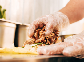 Normal_partial-view-of-cook-in-gloves-preparing-doner-keb-2021-09-22-01-15-38-utc