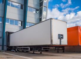 Normal_colored-truck-trailers-loading-2021-08-27-16-21-40-utc-min