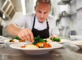 Normal_chef-garnishing-food-served-in-plate-at-restaurant-2021-08-29-00-16-57-utc__1_