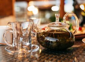 Normal_green-leaf-tea-is-brewed-in-a-teapot-there-is-a-t-2022-05-28-10-39-40-utc__1_