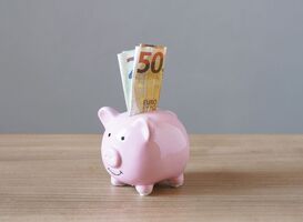 Normal_piggy-bank-or-money-box-with-euro-banknotes-as-sav-2022-11-16-17-06-39-utc__1_