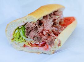 Normal_ham-and-salad-submarine-sandwich-from-freshly-cut-2022-11-12-11-22-47-utc__1_