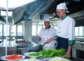 Normal_young-chef-university-professor-is-passing-on-the-2023-01-27-17-31-54-utc__1_