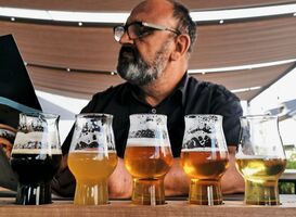 Normal_man-tasting-beer-in-bar-beer-glasses-on-tasting-b-2022-11-14-18-10-39-utc__1_