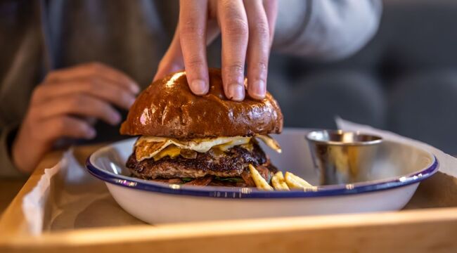 Carousel_close-up-burger-with-egg-and-meat-in-a-plate-with-2021-09-02-15-12-07-utc__1_