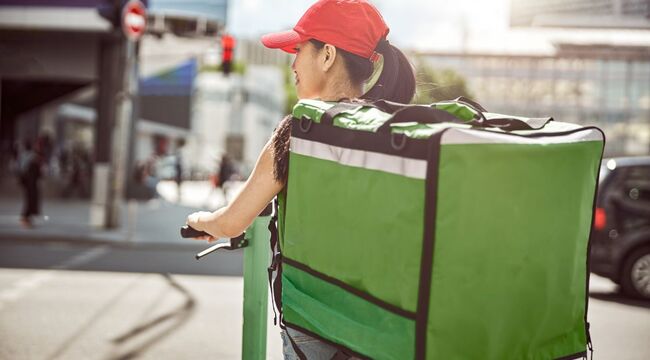 Carousel_food-courier-on-scooter-carrying-food-delivery-bag-2021-12-23-00-22-16-utc__1_